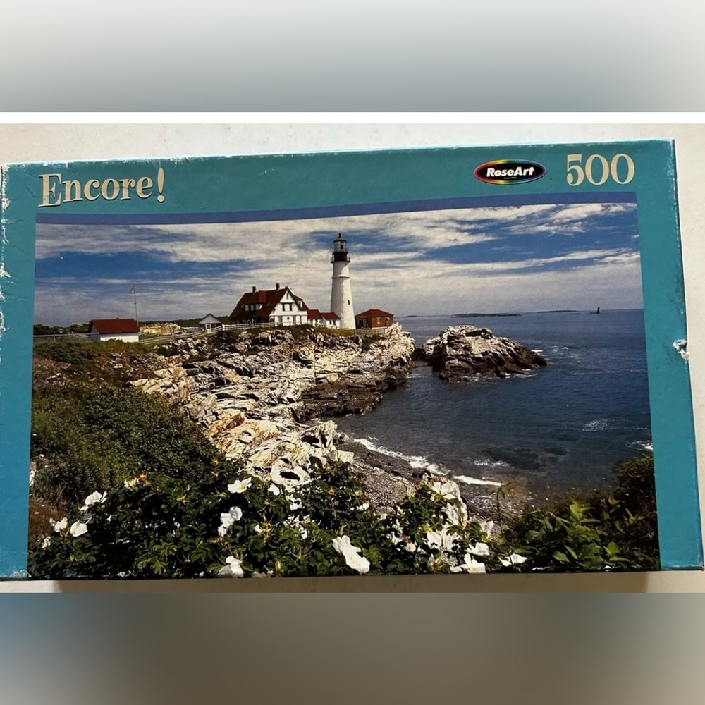 RoseArt Encore! 500 Piece Puzzle - White Rose at Portland Head Maine (1990)
